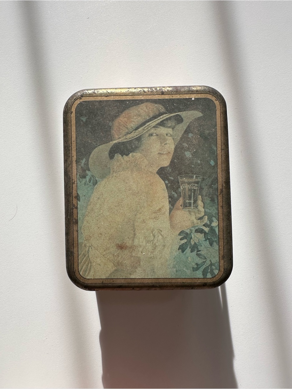 Coca Cola Pastel Lady Tin in Cream, Blue and Brown Tones